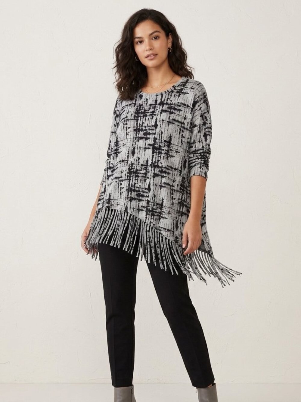 Kenzie Grey and black patterned long sleeve Asymmetrical fringed hemline